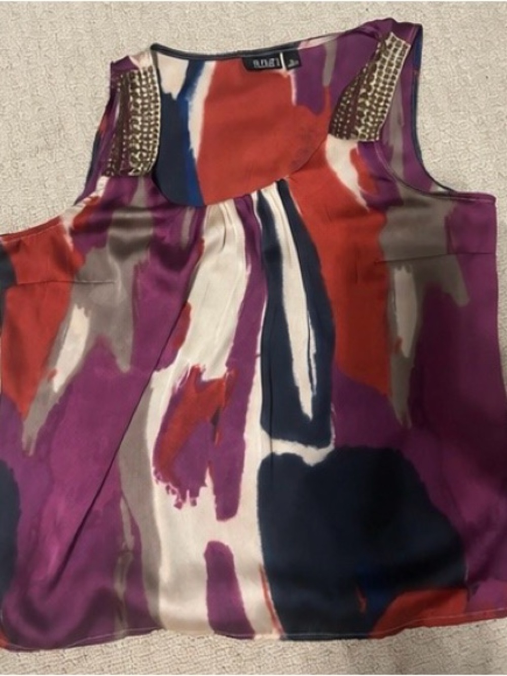 A. N.A. Petite Large Abstract Print Sleeveless Blouse Studded Shoulder
